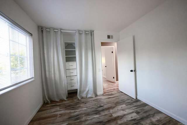 16320 Dartolo Rd, Ramona, CA 92065 - unfurnished bedroom featuring wood finished floors and baseboards