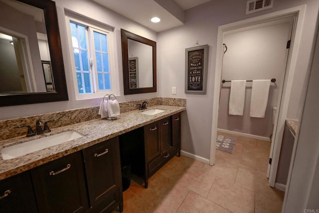 16320 Dartolo Rd, Ramona, CA 92065 - full bathroom with double vanity, tile patterned floors, recessed lighting, and a shower