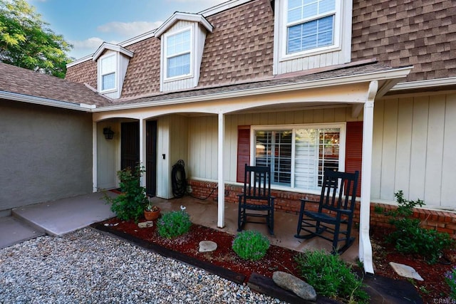 16320 Dartolo Rd, Ramona, CA 92065 - property entrance with roof with shingles and covered porch