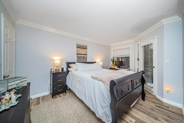 3773 1st Ave Unit 2, San Diego, CA 92103 - bedroom with light wood-style flooring and crown molding