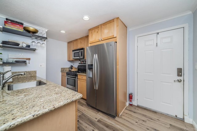 3773 1st Ave Unit 2, San Diego, CA 92103 - kitchen featuring appliances with stainless steel finishes, light wood-style flooring, open shelves, light stone counters, and recessed lighting