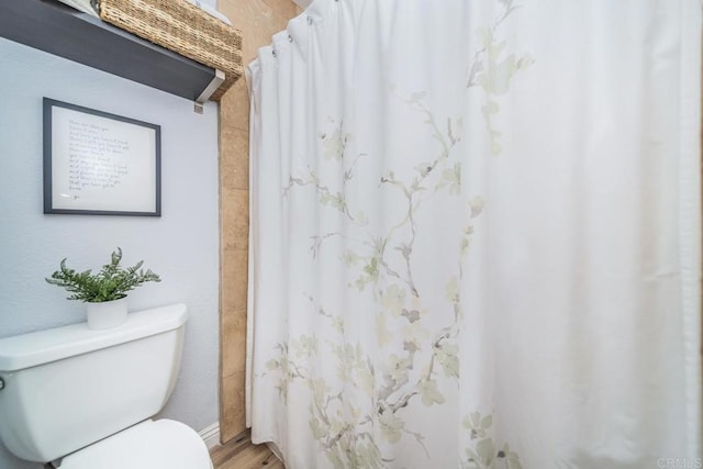 3773 1st Ave Unit 2, San Diego, CA 92103 - full bath with wood finished floors and a shower with curtain