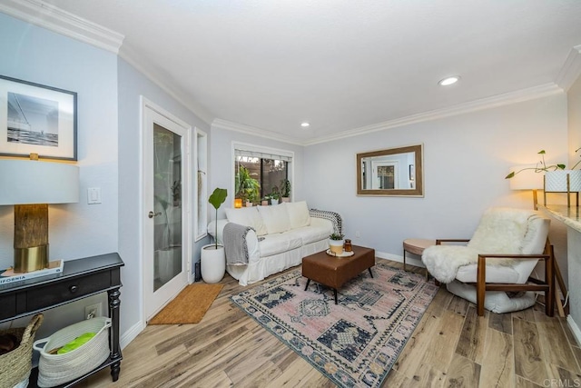 3773 1st Ave Unit 2, San Diego, CA 92103 - living area with crown molding, wood finished floors, and recessed lighting