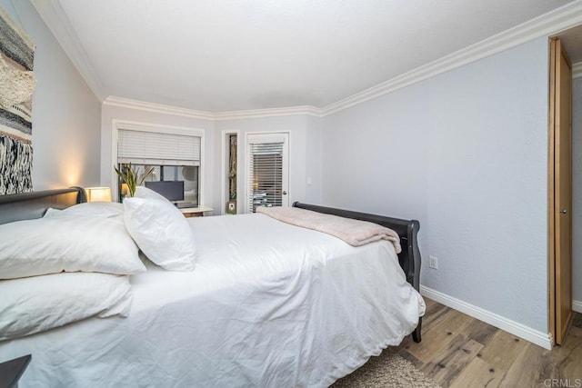 3773 1st Ave Unit 2, San Diego, CA 92103 - bedroom featuring wood finished floors and ornamental molding