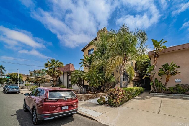 3773 1st Ave Unit 2, San Diego, CA 92103 - view of front facade featuring stucco siding and a chimney