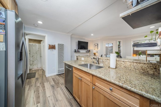 3773 1st Ave Unit 2, San Diego, CA 92103 - kitchen with appliances with stainless steel finishes, a heating unit, crown molding, light wood finished floors, and recessed lighting