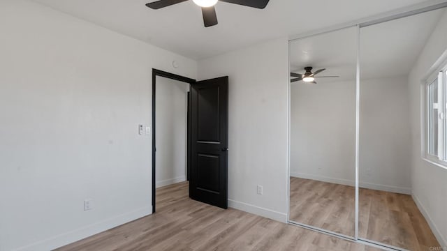 6117 Parkside Ave, San Diego, CA 92139 - unfurnished bedroom with wood finished floors and a ceiling fan