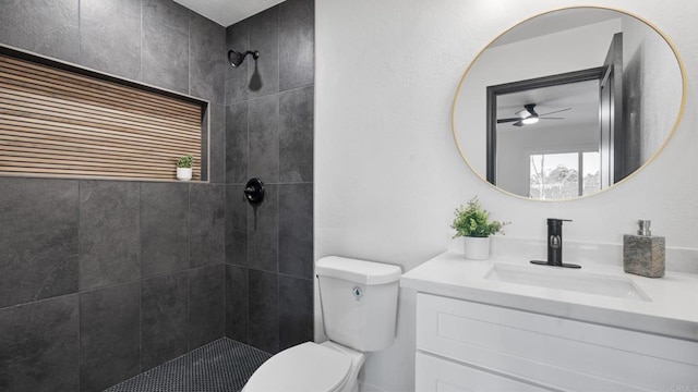 6117 Parkside Ave, San Diego, CA 92139 - full bath featuring vanity, a tile shower, and a ceiling fan