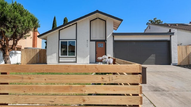 6117 Parkside Ave, San Diego, CA 92139 - view of front of property with driveway, stucco siding, and a garage