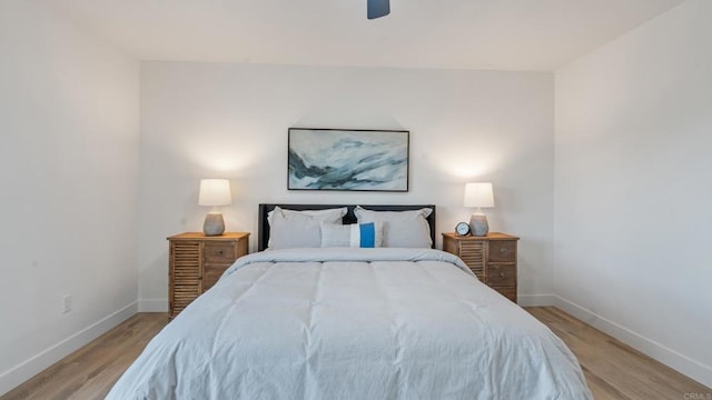 6117 Parkside Ave, San Diego, CA 92139 - bedroom with light wood-type flooring and ceiling fan