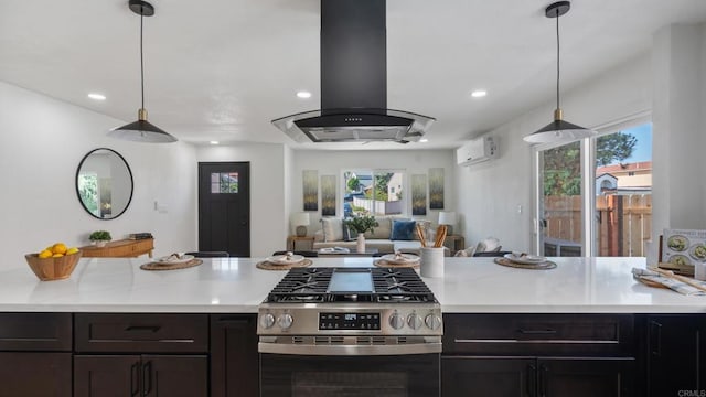6117 Parkside Ave, San Diego, CA 92139 - kitchen with stainless steel gas range oven, island range hood, a wall unit AC, light countertops, and open floor plan