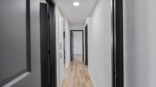 6117 Parkside Ave, San Diego, CA 92139 - corridor with light wood-style flooring