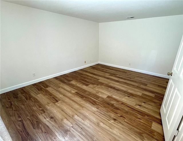 363 Cleo St, Laguna Beach, CA 92651 - unfurnished room with wood finished floors and baseboards