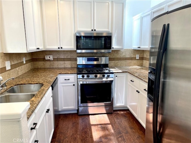 363 Cleo St, Laguna Beach, CA 92651 - kitchen featuring stainless steel appliances, white cabinets, dark wood-style floors, backsplash, and stone countertops