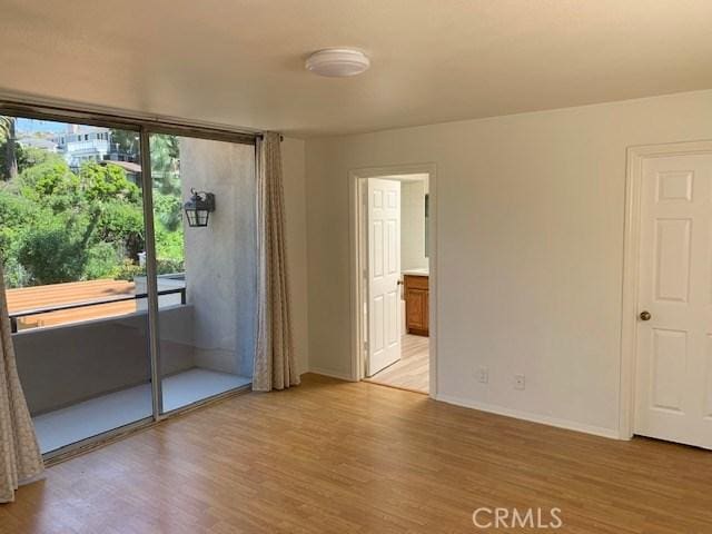 363 Cleo St, Laguna Beach, CA 92651 - empty room featuring light wood-style flooring and baseboards