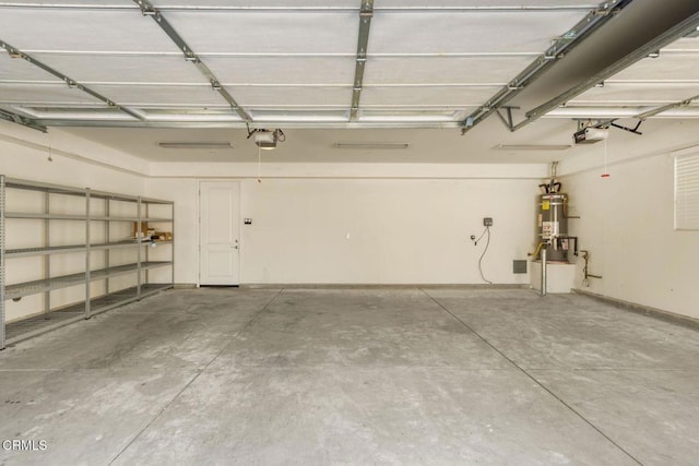 11570 Oakcrest Ave, Ojai, CA 93023 - garage featuring a garage door opener and secured water heater