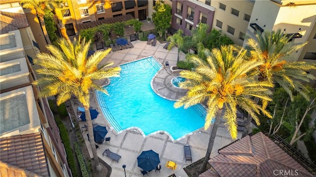 24545 Town Center Dr Unit 5201, Valencia, CA 91355 - community pool with a patio area