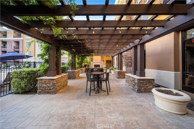 24545 Town Center Dr Unit 5201, Valencia, CA 91355 - view of patio / terrace featuring a pergola and outdoor dining space