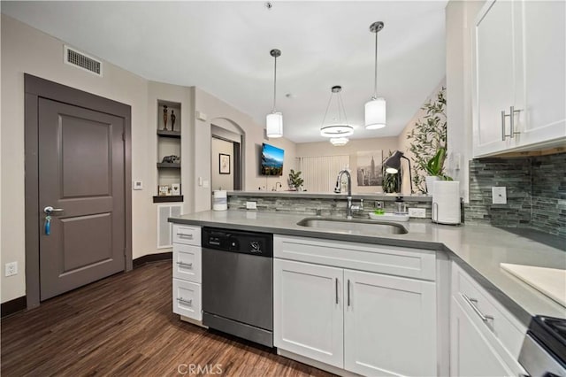 24545 Town Center Dr Unit 5201, Valencia, CA 91355 - kitchen featuring stainless steel dishwasher, a peninsula, white cabinets, and backsplash