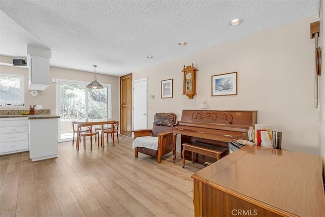 360 Carpio Dr, Diamond Bar, CA 91765 - living room featuring a textured ceiling, light wood finished floors, and recessed lighting