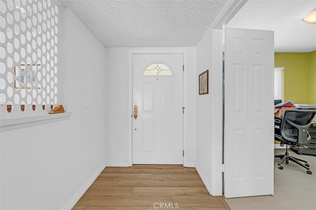 360 Carpio Dr, Diamond Bar, CA 91765 - foyer entrance featuring light wood-style floors and a textured ceiling