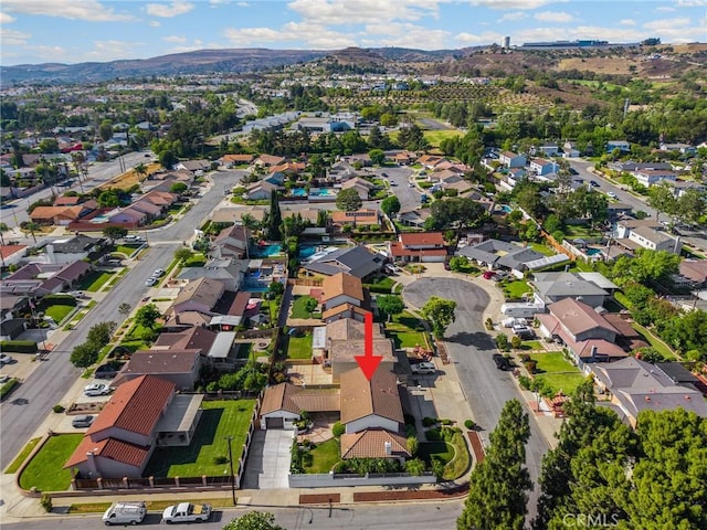 4161 Ricardo Dr, Yorba Linda, CA 92886 - aerial overview of property's location featuring nearby suburban area and a mountainous background