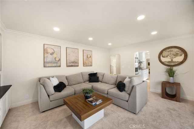 4161 Ricardo Dr, Yorba Linda, CA 92886 - living room with arched walkways, recessed lighting, light carpet, and crown molding