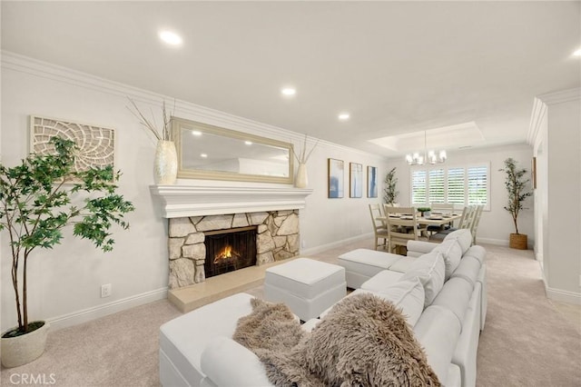 4161 Ricardo Dr, Yorba Linda, CA 92886 - living room featuring light colored carpet, a chandelier, ornamental molding, a stone fireplace, and recessed lighting