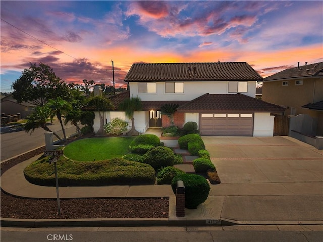 4161 Ricardo Dr, Yorba Linda, CA 92886 - view of front of house featuring a tile roof, concrete driveway, a garage, and stucco siding
