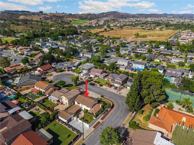 4161 Ricardo Dr, Yorba Linda, CA 92886 - aerial view of property and surrounding area featuring a mountainous background and nearby suburban area