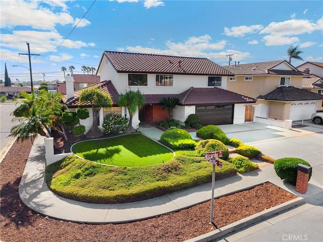 4161 Ricardo Dr, Yorba Linda, CA 92886 - mediterranean / spanish home featuring a tiled roof, concrete driveway, and stucco siding