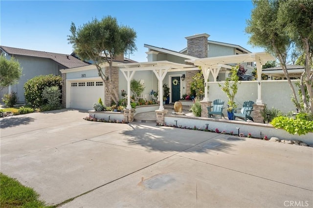 2172 N Pami Cir, Orange, CA 92867 - mid-century modern home featuring a garage, stucco siding, and driveway