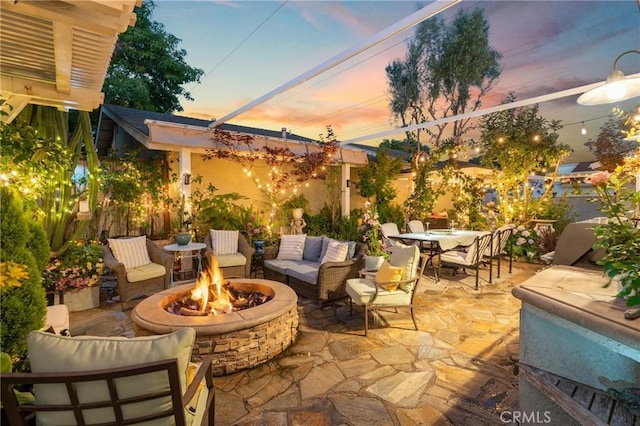2172 N Pami Cir, Orange, CA 92867 - patio terrace at dusk with an outdoor living space with a fire pit, a patio, and outdoor dining area