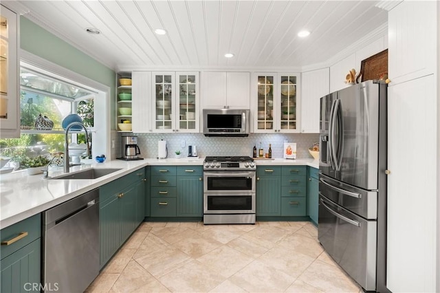 2172 N Pami Cir, Orange, CA 92867 - kitchen with stainless steel appliances, green cabinetry, white cabinets, recessed lighting, and ornamental molding
