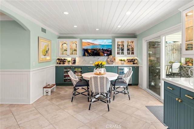 2172 N Pami Cir, Orange, CA 92867 - dining room featuring crown molding, a wainscoted wall, recessed lighting, arched walkways, and beverage cooler
