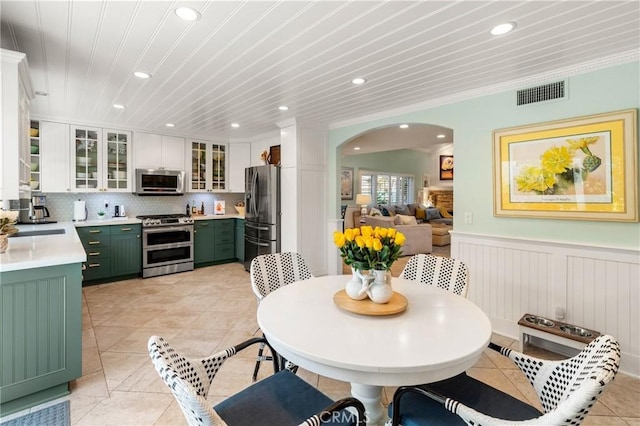 2172 N Pami Cir, Orange, CA 92867 - dining space featuring recessed lighting, arched walkways, wainscoting, and light tile patterned floors