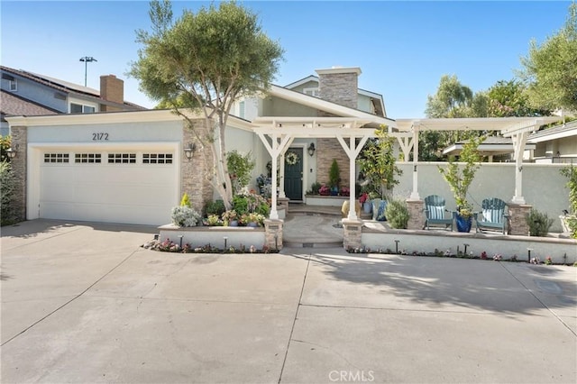 2172 N Pami Cir, Orange, CA 92867 - view of front of home featuring driveway, an attached garage, and stucco siding