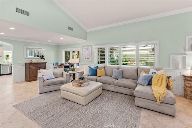2172 N Pami Cir, Orange, CA 92867 - living area featuring light tile patterned floors, ornamental molding, arched walkways, high vaulted ceiling, and wainscoting