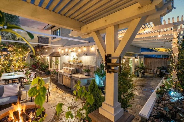 2172 N Pami Cir, Orange, CA 92867 - view of patio featuring exterior kitchen, a pergola, a fire pit, and outdoor dining area