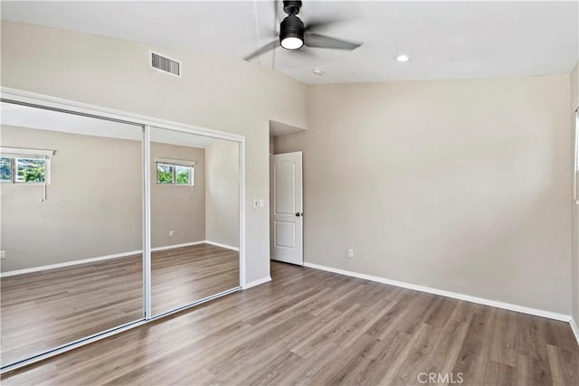 3919 W 242nd St Unit A, Torrance, CA 90505 - unfurnished bedroom featuring a closet, wood finished floors, a ceiling fan, recessed lighting, and lofted ceiling