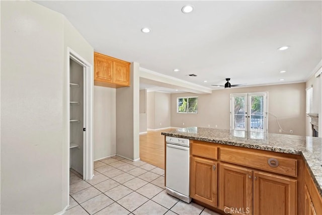 3919 W 242nd St Unit A, Torrance, CA 90505 - kitchen with a ceiling fan, plenty of natural light, recessed lighting, light stone countertops, and light tile patterned floors