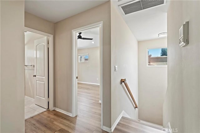 3919 W 242nd St Unit A, Torrance, CA 90505 - hall featuring an upstairs landing, wood finished floors, and healthy amount of natural light