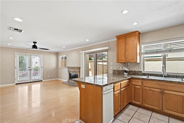 3919 W 242nd St Unit A, Torrance, CA 90505 - kitchen featuring a ceiling fan, recessed lighting, dark stone countertops, ornamental molding, and open floor plan