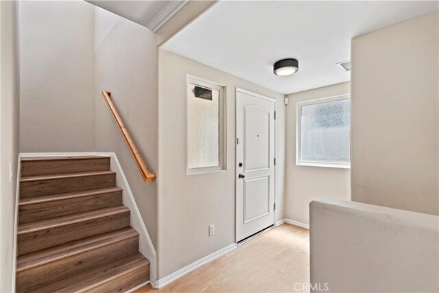 3919 W 242nd St Unit A, Torrance, CA 90505 - foyer with light wood-type flooring and stairs