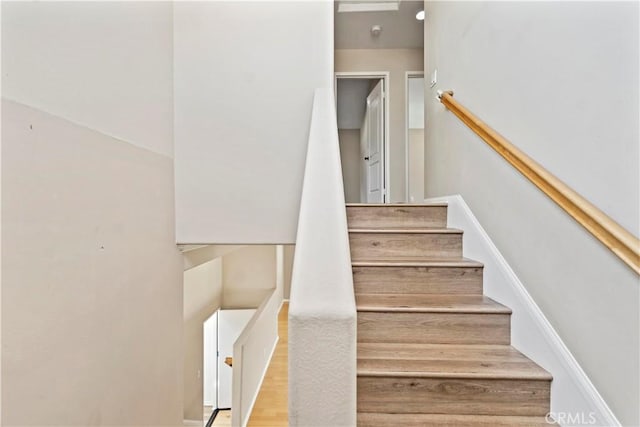 3919 W 242nd St Unit A, Torrance, CA 90505 - stairs featuring wood finished floors