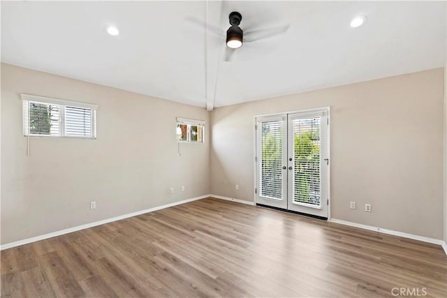 3919 W 242nd St Unit A, Torrance, CA 90505 - empty room featuring french doors, healthy amount of natural light, a ceiling fan, wood finished floors, and recessed lighting