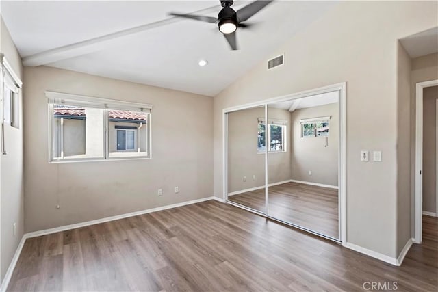 3919 W 242nd St Unit A, Torrance, CA 90505 - unfurnished bedroom with wood finished floors, a closet, lofted ceiling, and a ceiling fan
