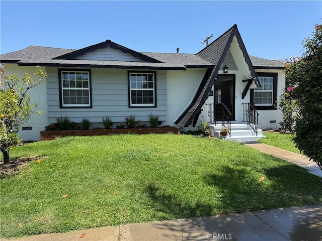 5781 Lime Ave, Cypress, CA 90630 - view of front of home featuring a front lawn and a shingled roof