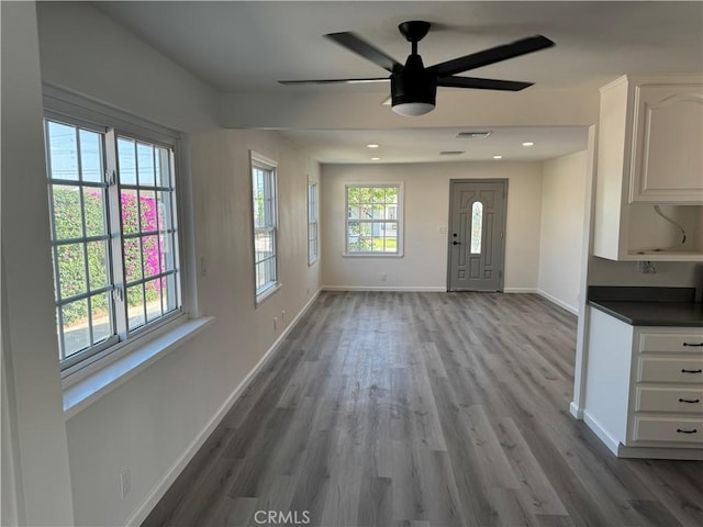 5781 Lime Ave, Cypress, CA 90630 - unfurnished dining area with wood finished floors, ceiling fan, and recessed lighting