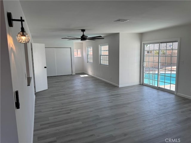 5781 Lime Ave, Cypress, CA 90630 - spare room featuring dark wood-type flooring and a ceiling fan